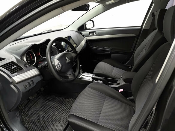 2010 Mitsubishi Lancer X, чёрный - вид 15