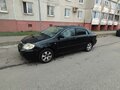 2005 Toyota Corolla IX (E120, E130) Рестайлинг, чёрный, 305000 рублей - вид 1