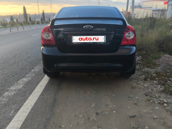 2011 Ford Focus II Рестайлинг, чёрный, 540000 рублей - вид 2