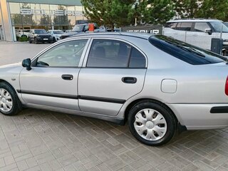 2003 Mitsubishi Carisma I Рестайлинг, серебристый, 299900 рублей, вид 4