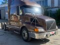 2002 Volvo VNL, коричневый, 3000000 рублей