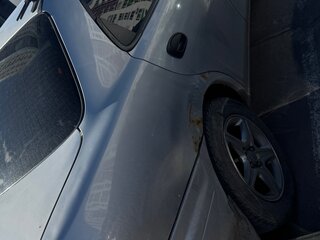 1997 Mazda Familia VII (BH), серебристый, 105000 рублей, вид 4