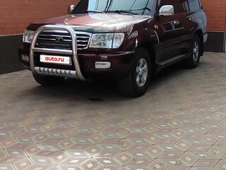 2001 Toyota Land Cruiser 105 100 Series, красный, 2500000 рублей, вид 2