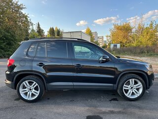 2011 Volkswagen Tiguan I, чёрный, 900000 рублей, вид 2