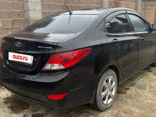 2012 Hyundai Solaris I, чёрный, 700000 рублей, вид 3