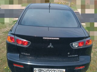 2011 Mitsubishi Lancer X Рестайлинг, чёрный, 700000 рублей, вид 3