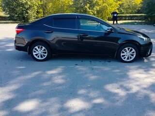 2013 Toyota Corolla XI (E160, E170, E180), чёрный, 1350000 рублей, вид 3