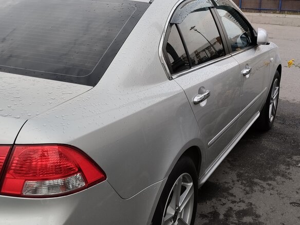 2009 Kia Magentis II Рестайлинг, серебристый, 750000 рублей - вид 9