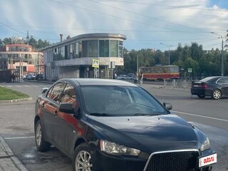 2011 Mitsubishi Lancer X Рестайлинг, чёрный, 1100000 рублей, вид 2