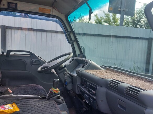 2011 Isuzu Elf (N-series), белый, 1100000 рублей - вид 7