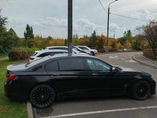 2010 BMW 7 серии Long 750Li xDrive V (F01/F02/F04), чёрный, 1700777 рублей, вид 4