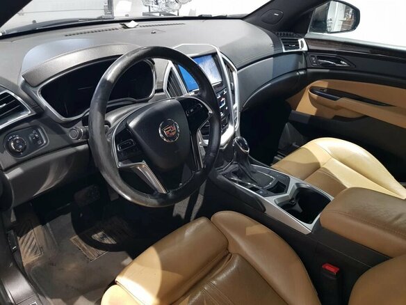 2014 Cadillac SRX II Рестайлинг, коричневый, 1309000 рублей - вид 7