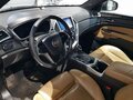2014 Cadillac SRX II Рестайлинг, коричневый, 1309000 рублей - вид 7