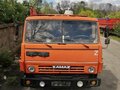 1989 КамАЗ 55102, оранжевый, 500000 рублей