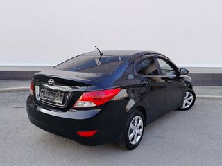 2011 Hyundai Solaris I, чёрный, 559000 рублей, вид 3