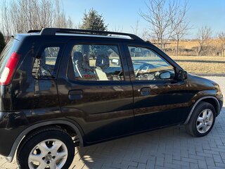 2003 Suzuki Ignis I (HT), чёрный, 410000 рублей, вид 5