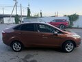 2015 Ford Fiesta Mk6 Рестайлинг, коричневый, 700000 рублей - вид 1