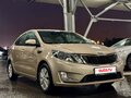 2012 Kia Rio 4-speed III, бежевый - вид 8