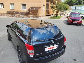 2011 Toyota Corolla Fielder X (E140, E150) Рестайлинг, чёрный, 900000 рублей, вид 4