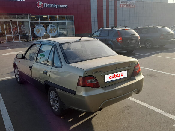 2010 Daewoo Nexia I Рестайлинг, золотистый, 160000 рублей - вид 8