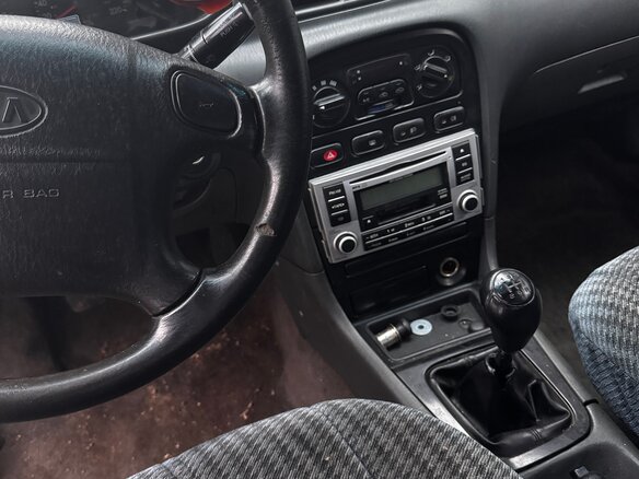 2000 Kia Clarus II, серебристый, 130000 рублей - вид 6