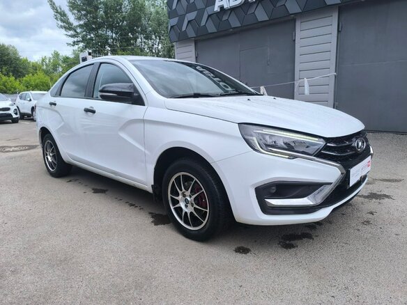 2023 Lada (ВАЗ) Vesta I Рестайлинг (NG), белый, 979877 рублей - вид 2