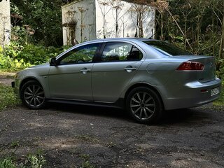 2012 Mitsubishi Lancer X Рестайлинг, серебристый, 700000 рублей, вид 3