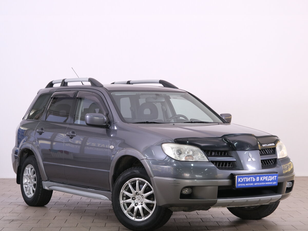Открыть фотографии: Mitsubishi Outlander I