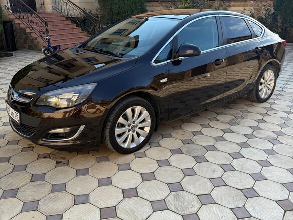 2014 Opel Astra J Рестайлинг, коричневый, 870000 рублей - вид 4