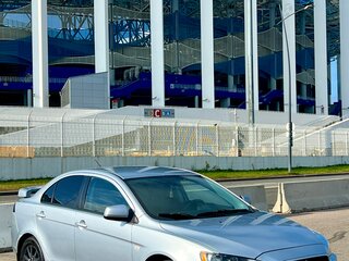 2014 Mitsubishi Lancer X Рестайлинг, серебристый, 910000 рублей, вид 3