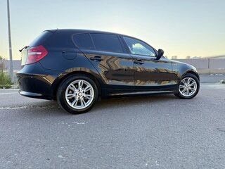 2010 BMW 1 серии 116i I (E81/E82/E87/E88) Рестайлинг, чёрный, 665000 рублей, вид 4