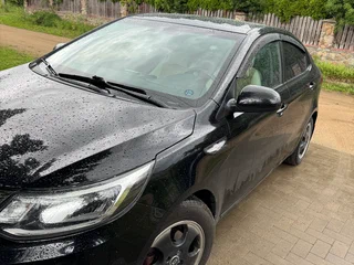 2016 Kia Rio III Рестайлинг, чёрный, 999999 рублей, вид 2