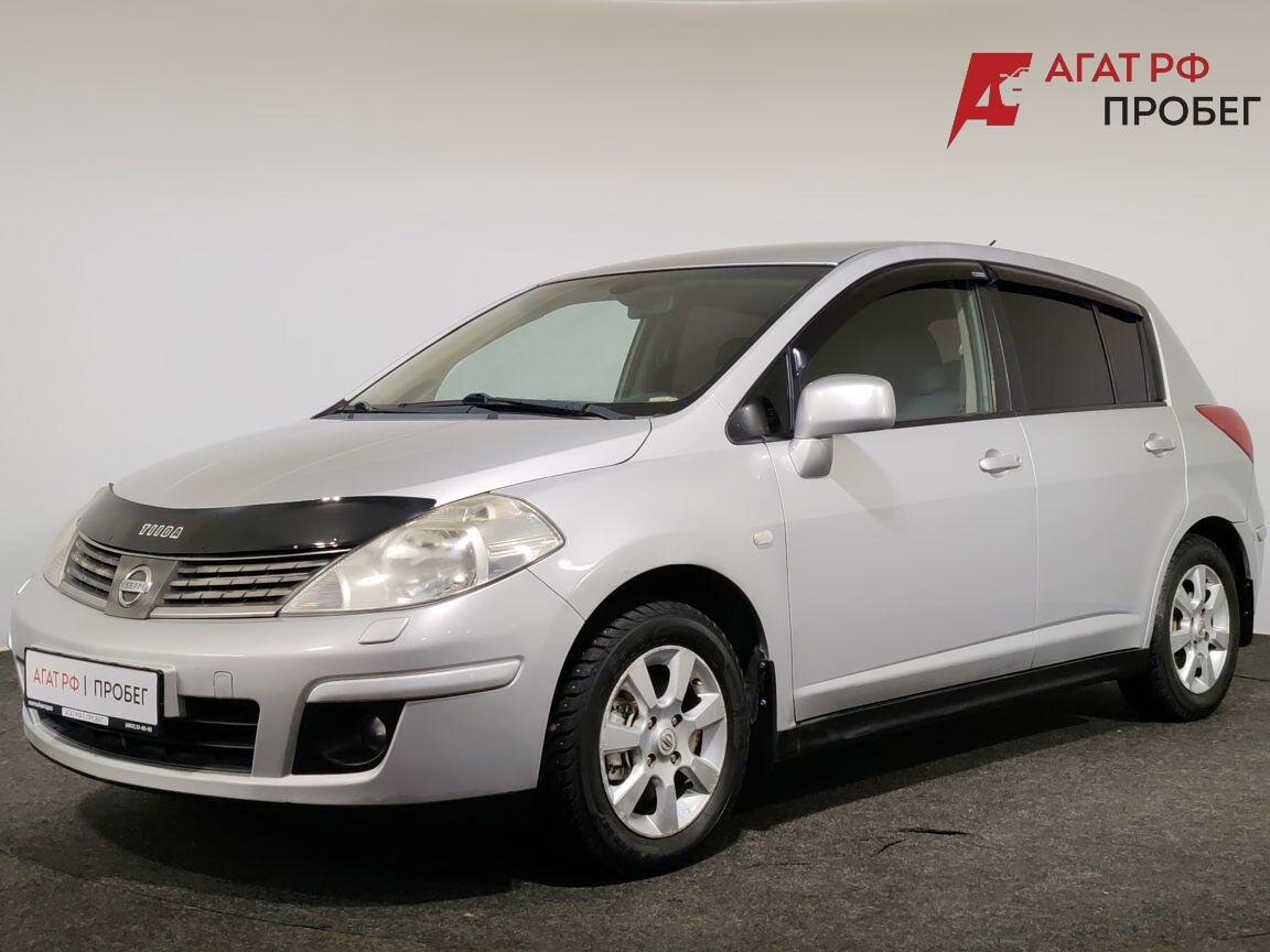 Открыть фотографии: Nissan Tiida I