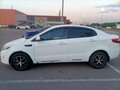2013 Kia Rio 5-speed III, белый, 666000 рублей - вид 2