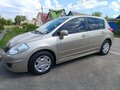 2010 Nissan Tiida I, коричневый - вид 8