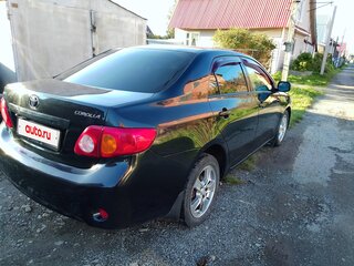 2009 Toyota Corolla X (E140, E150), чёрный, 750000 рублей, вид 2