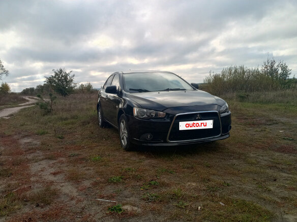 2008 Mitsubishi Lancer X, чёрный, 650000 рублей - вид 31