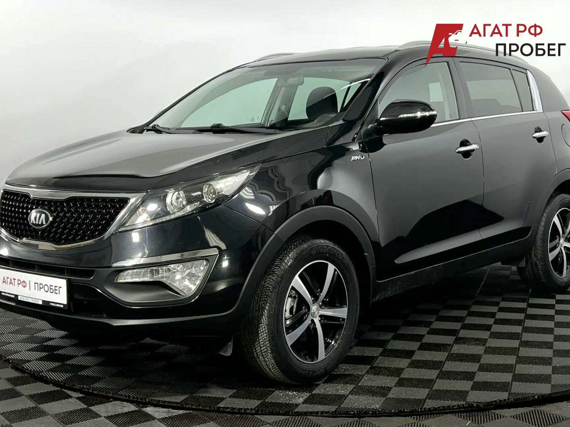 Открыть фотографии: Kia Sportage III