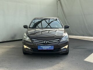 2016 Hyundai Solaris I Рестайлинг, коричневый, 990000 рублей, вид 3
