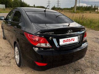 2011 Hyundai Solaris I, чёрный, 720000 рублей, вид 4