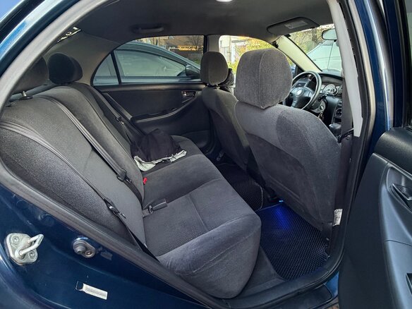 2003 Toyota Corolla IX (E120, E130), синий, 600000 рублей - вид 8