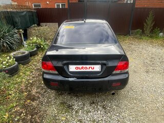 2009 Mitsubishi Lancer Classic IX Рестайлинг, чёрный, 450000 рублей, вид 3