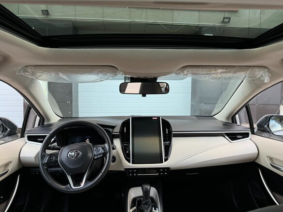 2022 Toyota Corolla XII (E210), коричневый, 1790000 рублей - вид 11