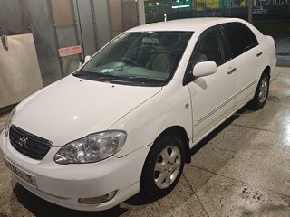 2004 Toyota Corolla IX (E120, E130) Рестайлинг, белый, 450000 рублей, вид 3
