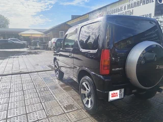 2011 Suzuki Jimny Kei car III Рестайлинг 1, чёрный, 1000000 рублей, вид 3