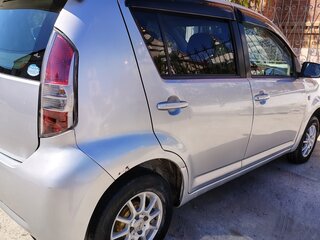2009 Toyota Passo I (C10), серый, 400000 рублей, вид 4