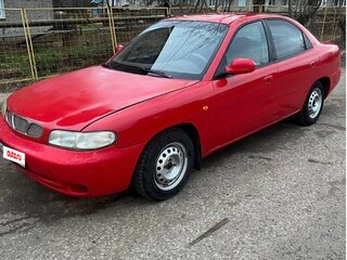 1999 Daewoo Nubira I, красный, 125000 рублей, вид 1
