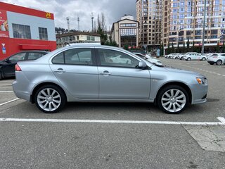 2009 Mitsubishi Lancer X, серебристый, 650000 рублей, вид 4