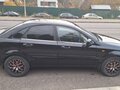 2013 Daewoo Gentra II, чёрный - вид 4
