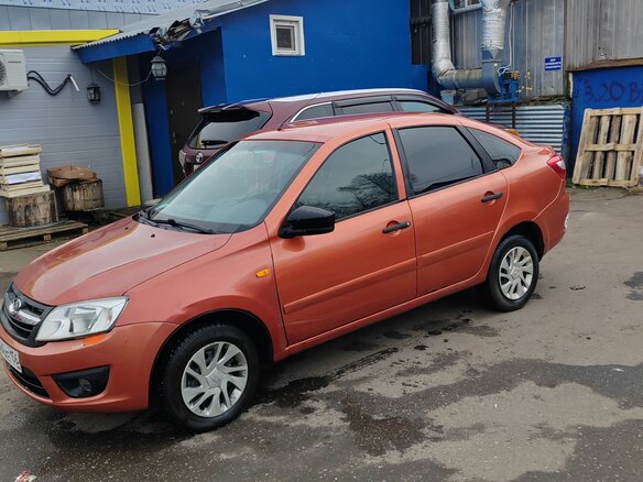 2015 Lada (ВАЗ) Granta I, оранжевый, 600000 рублей - вид 3